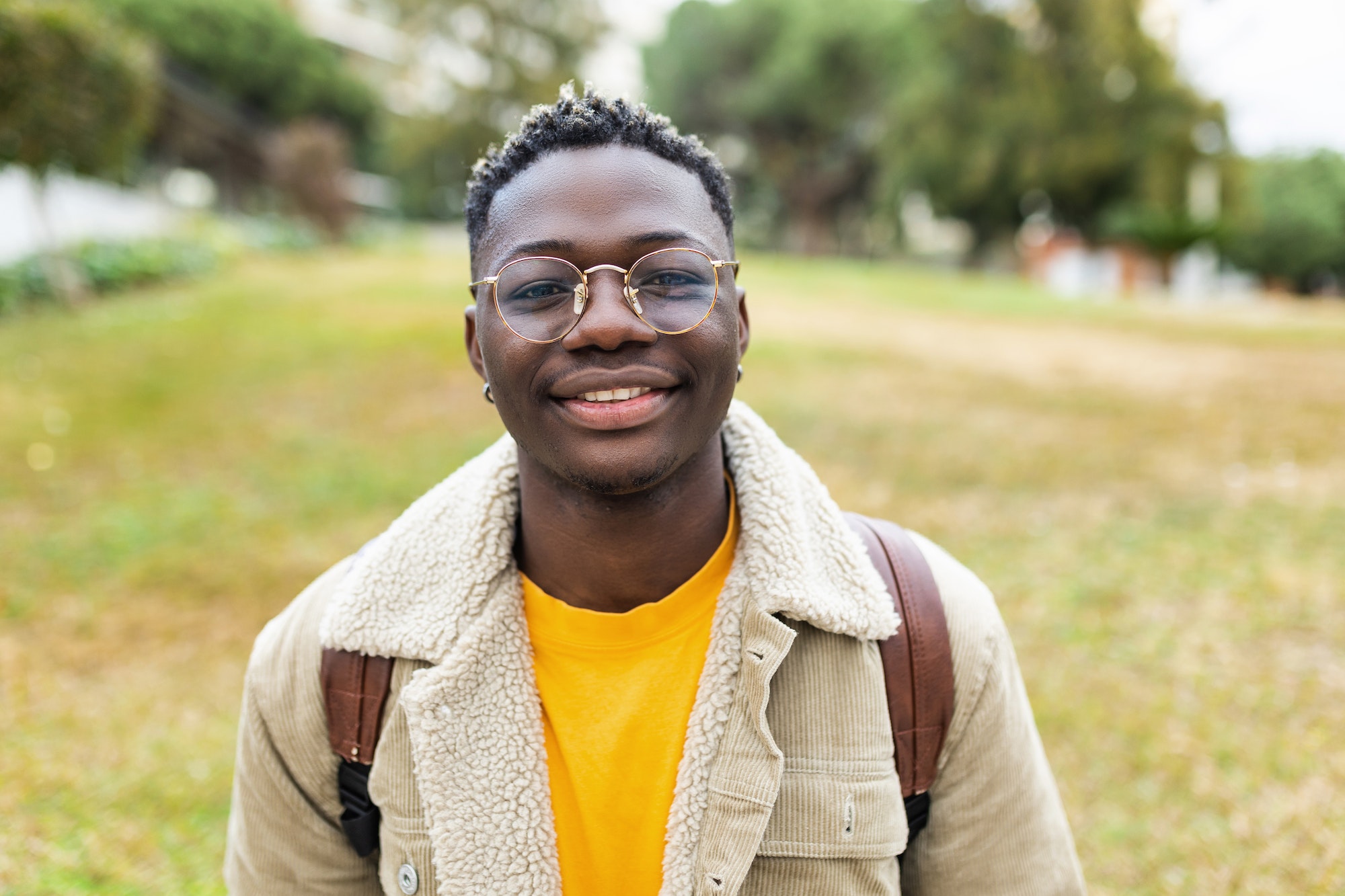 smiling-african-young-student-man-looking-at-camera-outdoors.jpg